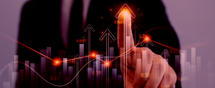 A man in a suit points at a graph illustrating an upward trend in forex trading profits.