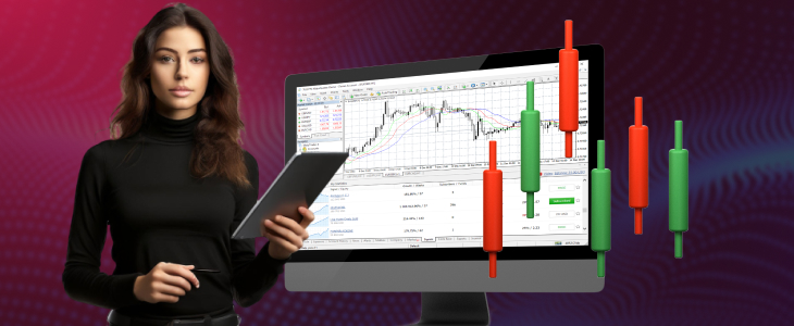 A woman holds a tablet displaying a stock market graph on a computer screen, analyzing financial data.